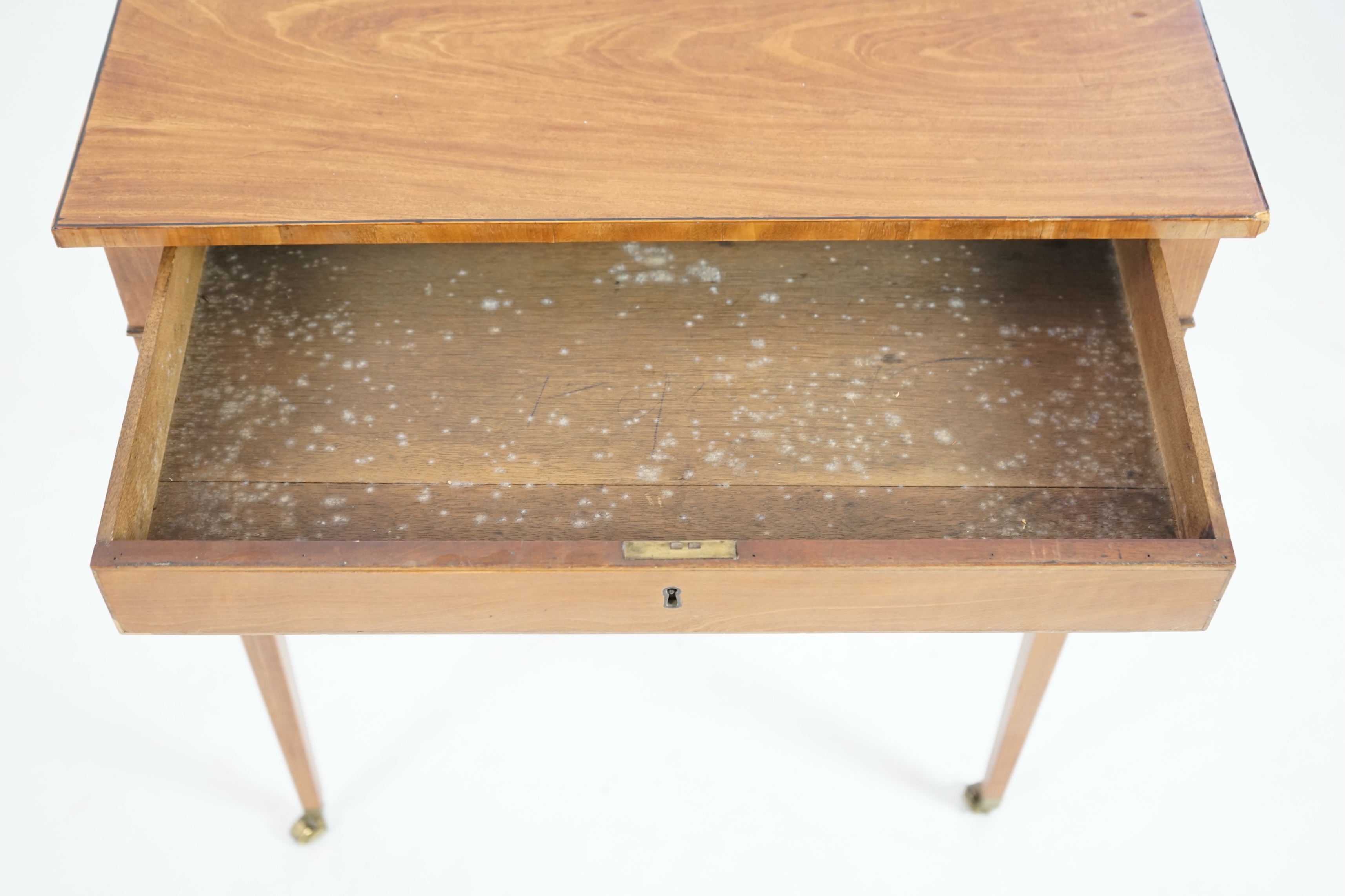 An Edwardian satinwood occasional table